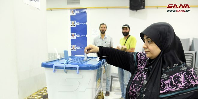 Iranians residing in Syria participate in homeland presidential elections